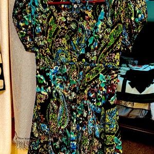 Very cute shirt with jewels that tie around neck